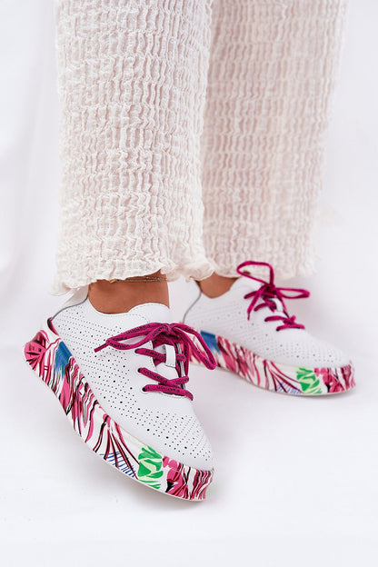 white sport shoes front view