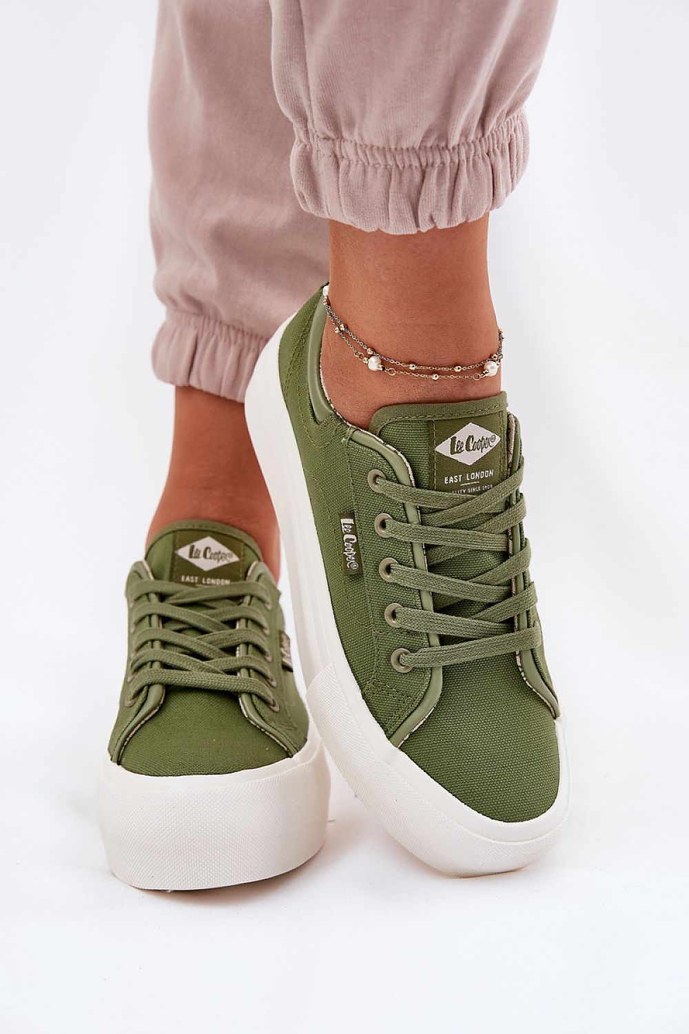 green sneakers detail view