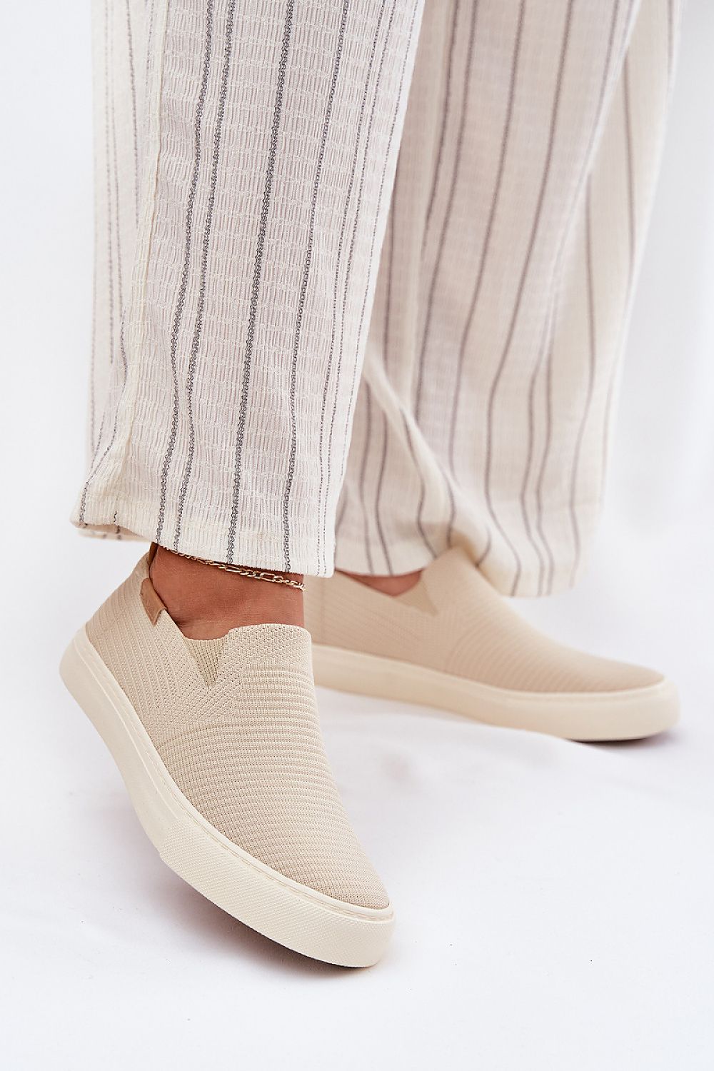 beige sneakers front view