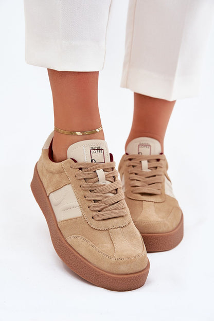 beige sport shoes detail view