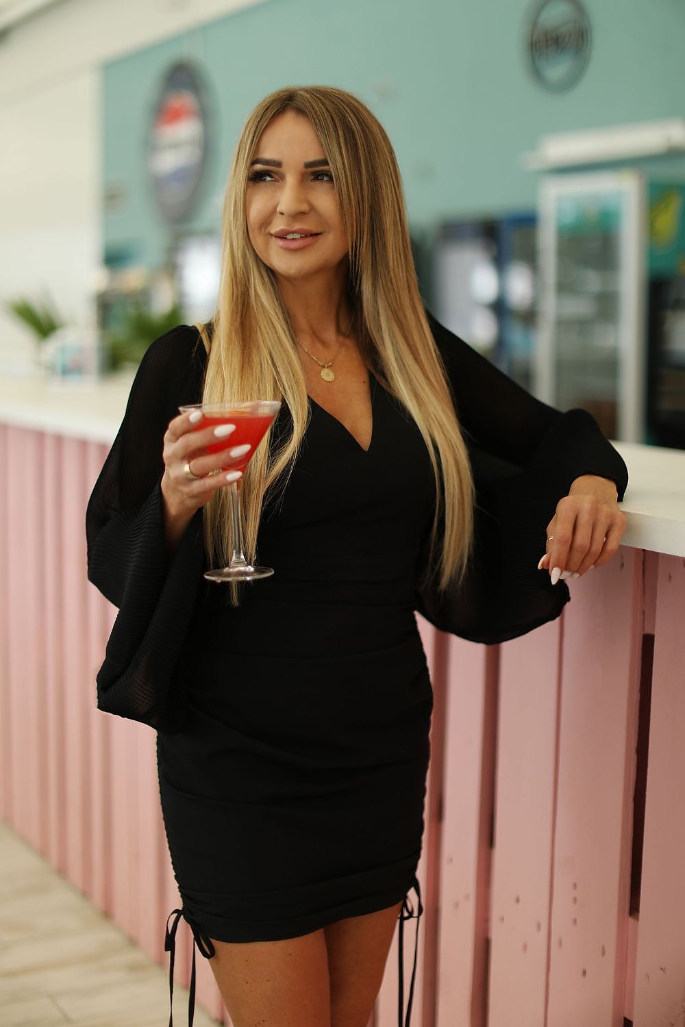 black v-neck midi elegant black v-neck midi dress – adjustable feminine daywear with romantic silhouette front view