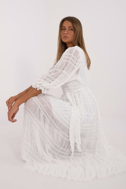 white flared belted day dress back view