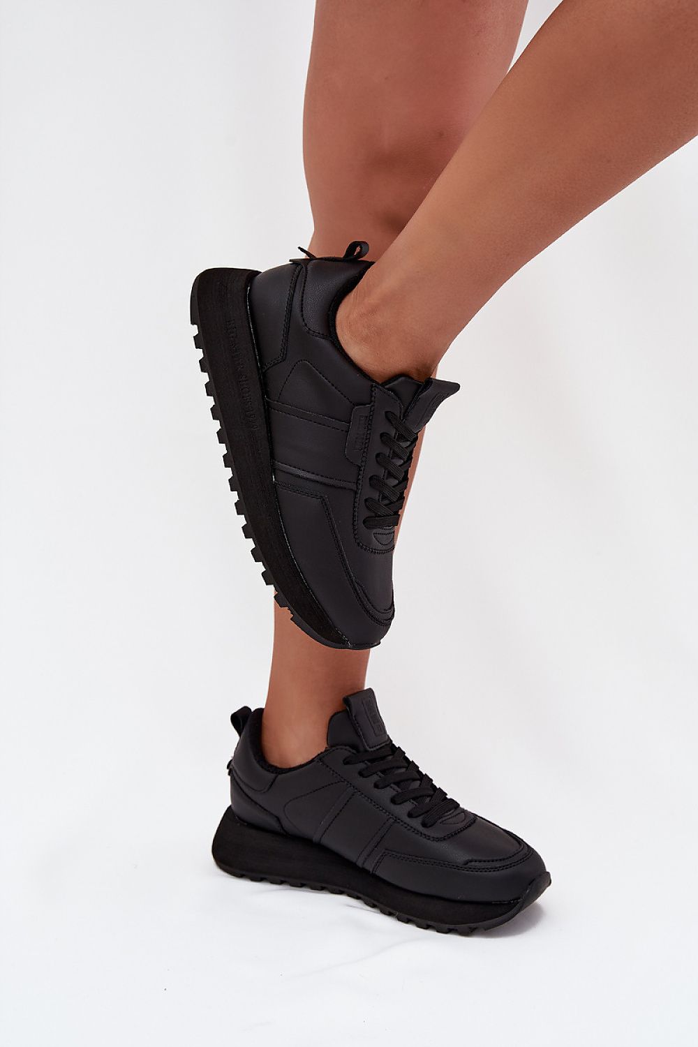 black sport shoes detail view