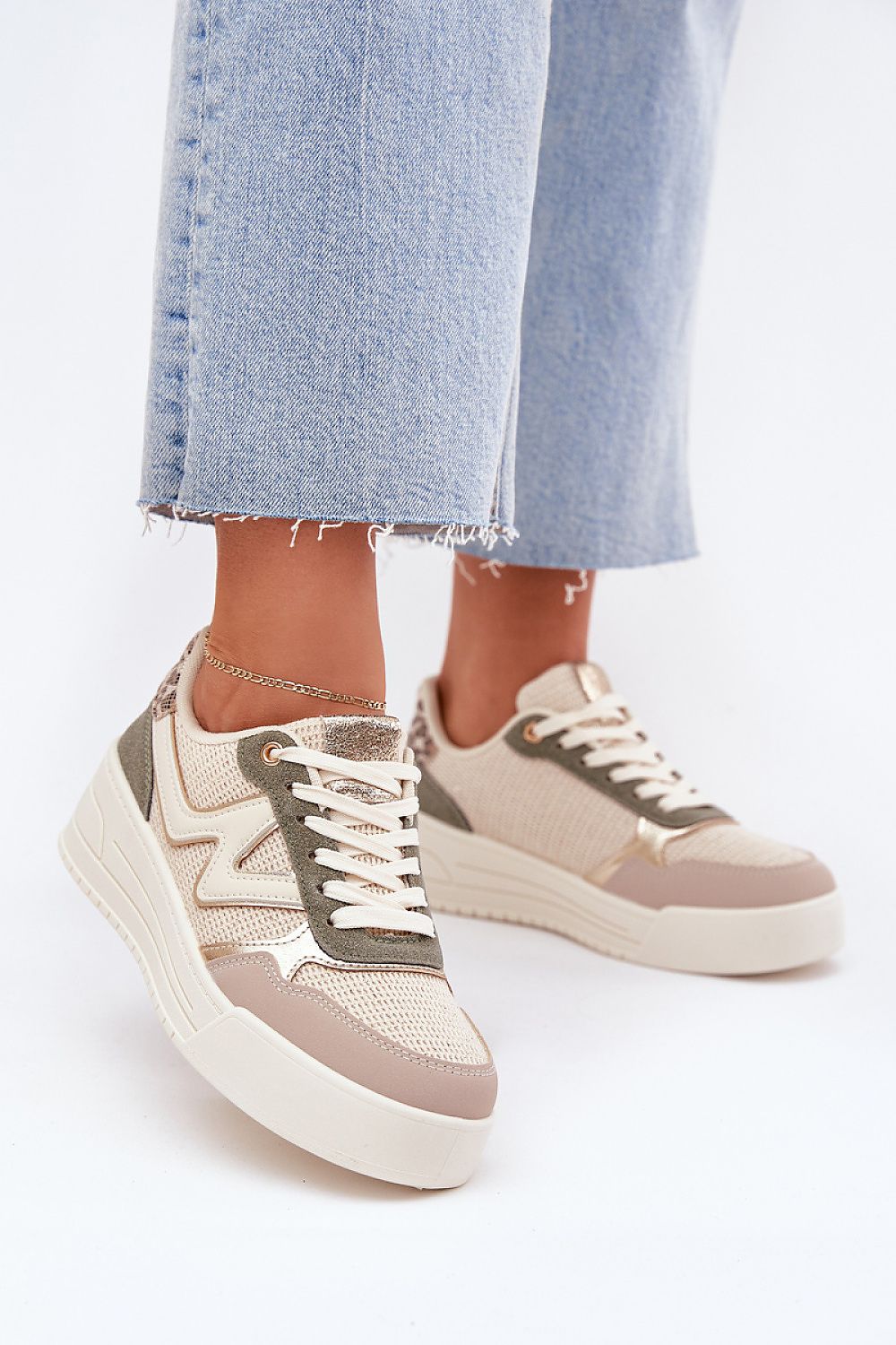 beige sport shoes front view