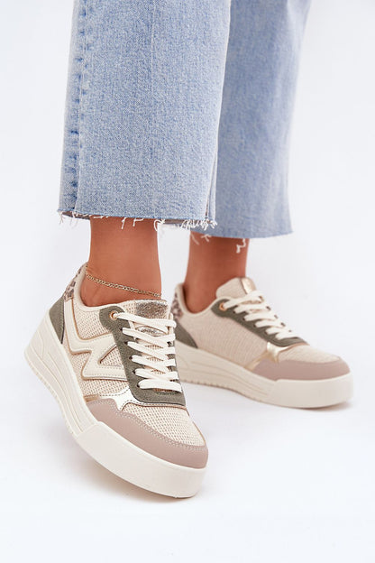 beige sport shoes front view