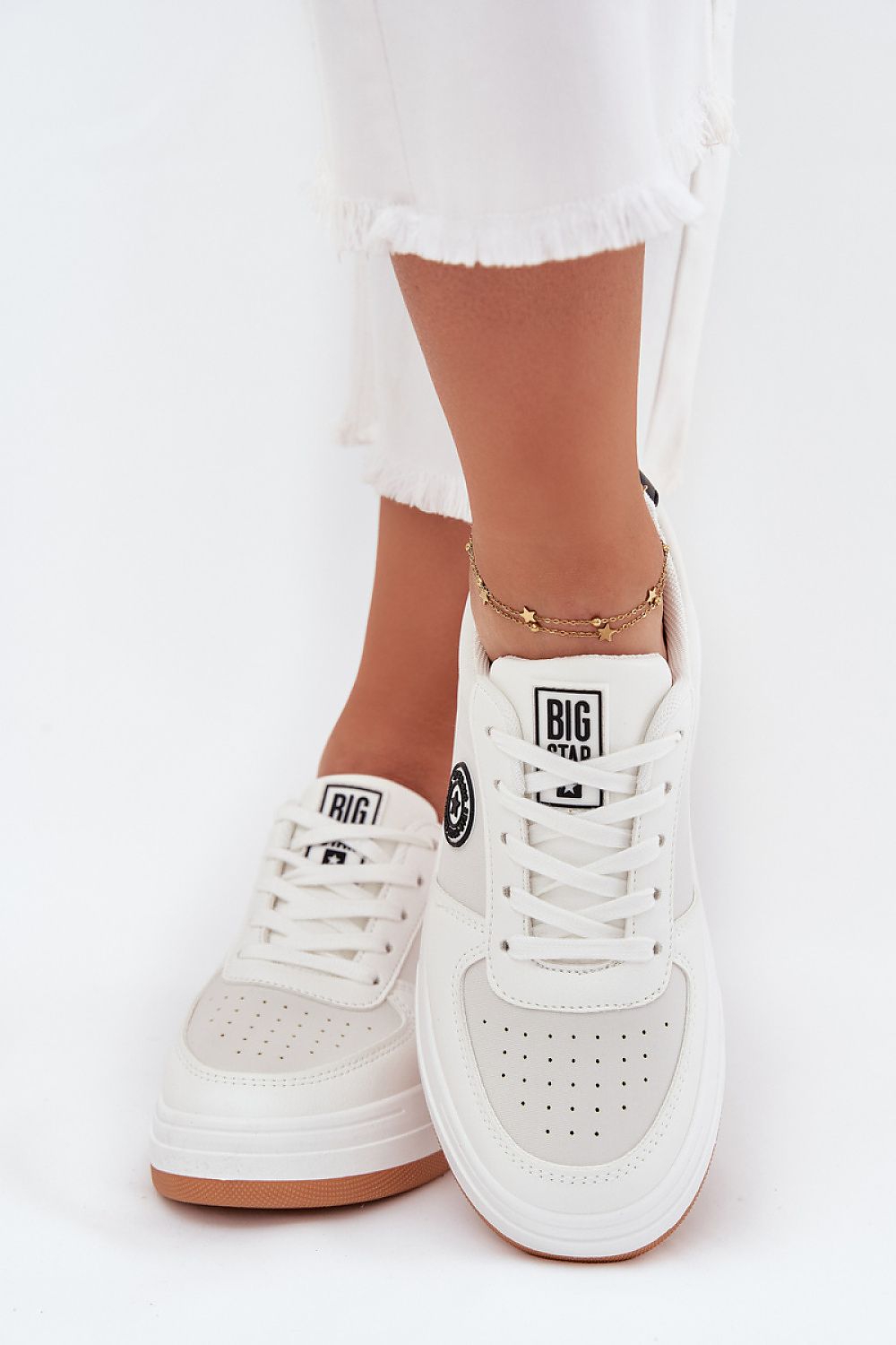 white sport shoes detail view