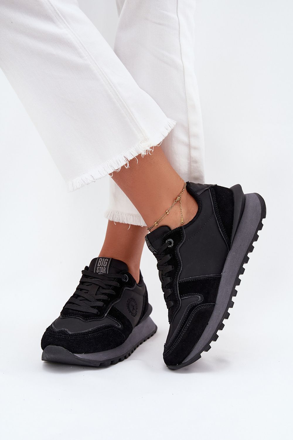 black sport shoes front view