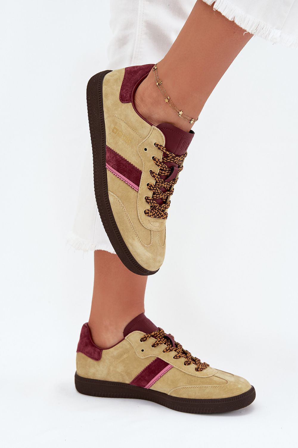 green sport shoes detail view