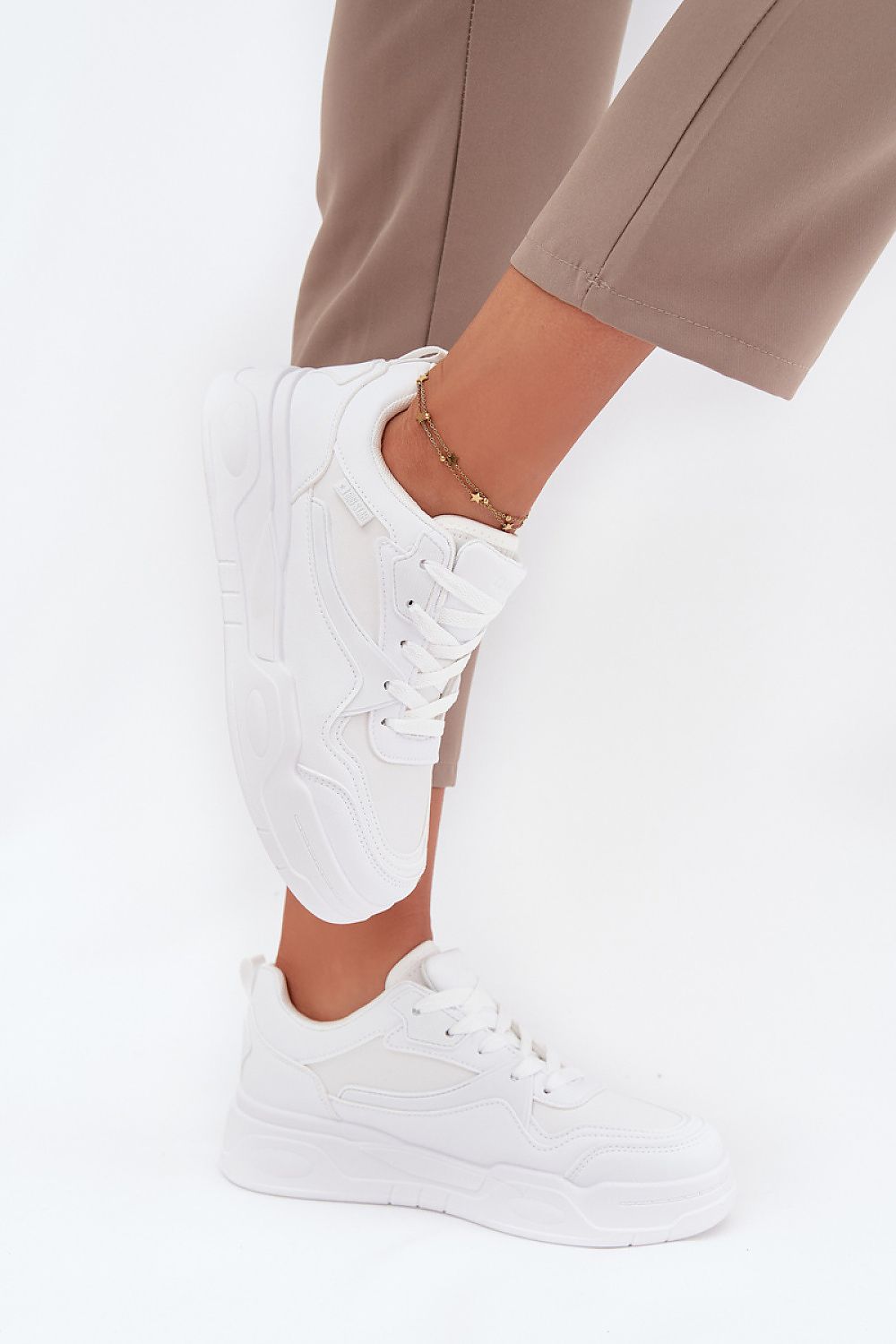 white sport shoes detail view