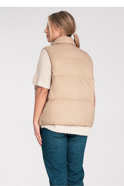 beige gilet detail view