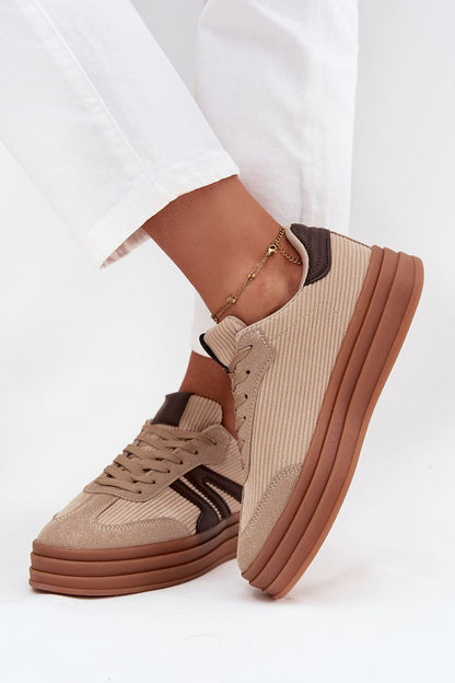 beige sport shoes front view