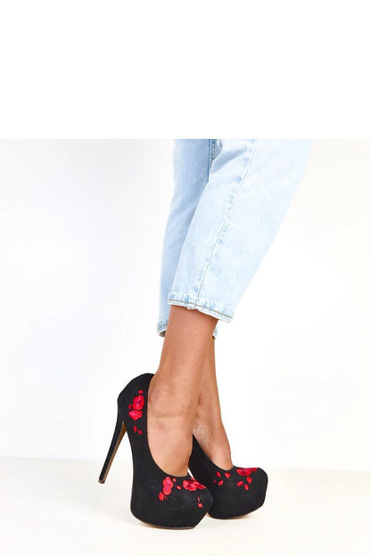 black mini high heels front view