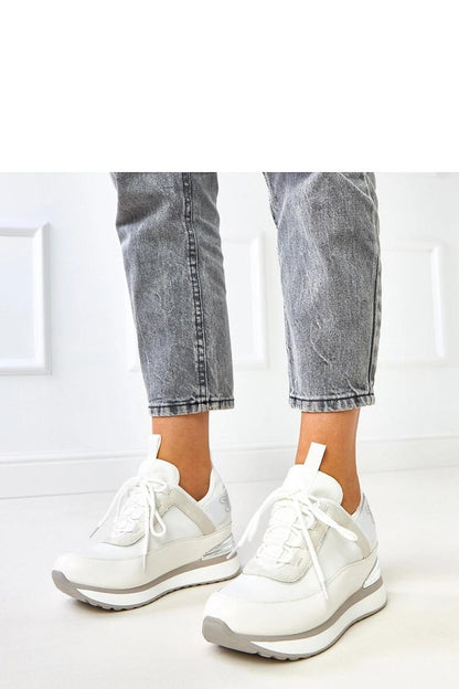 white sport shoes front view