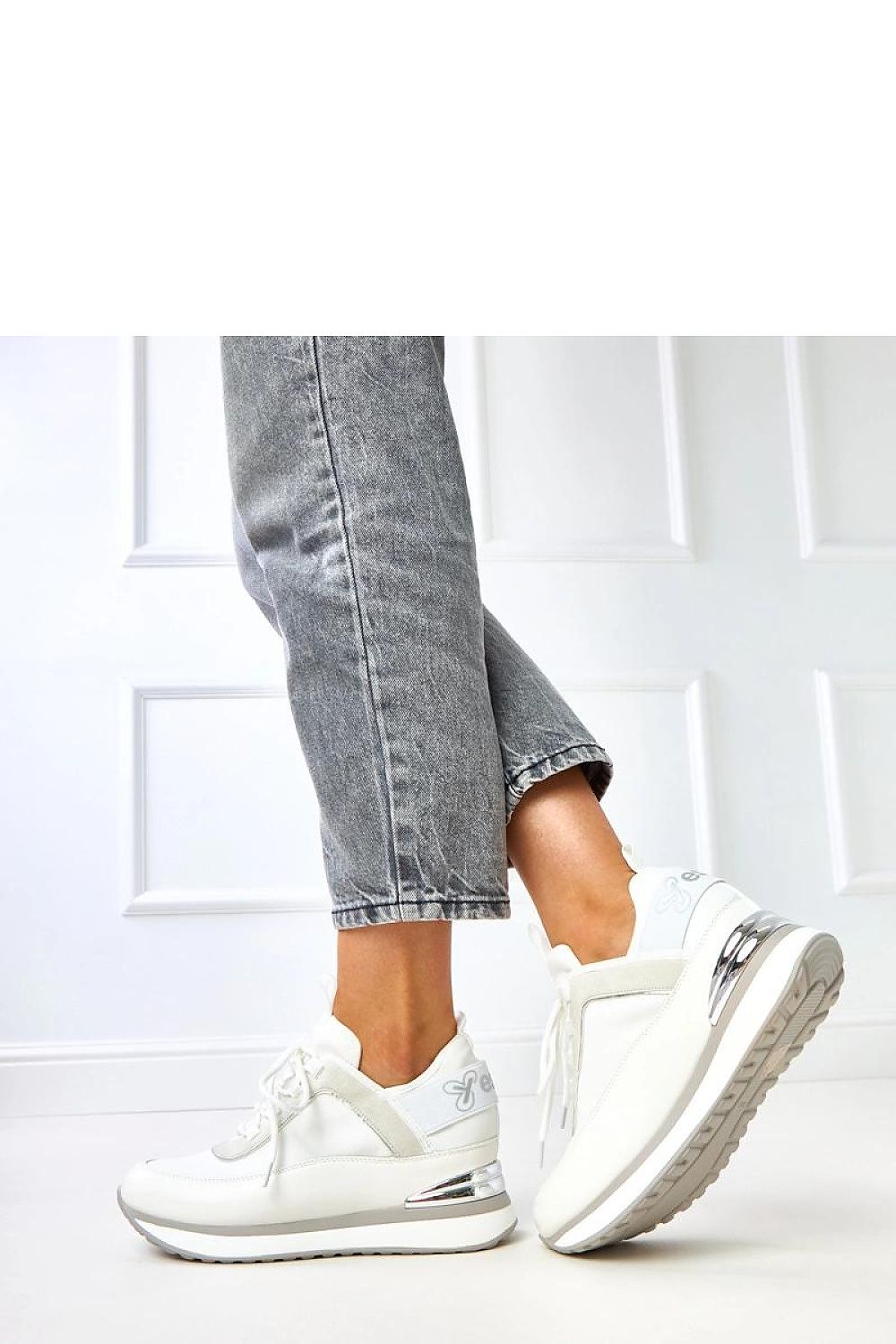 white sport shoes detail view