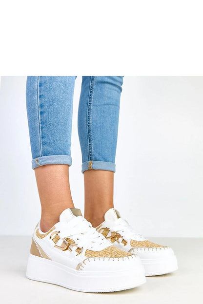 beige sport shoes front view