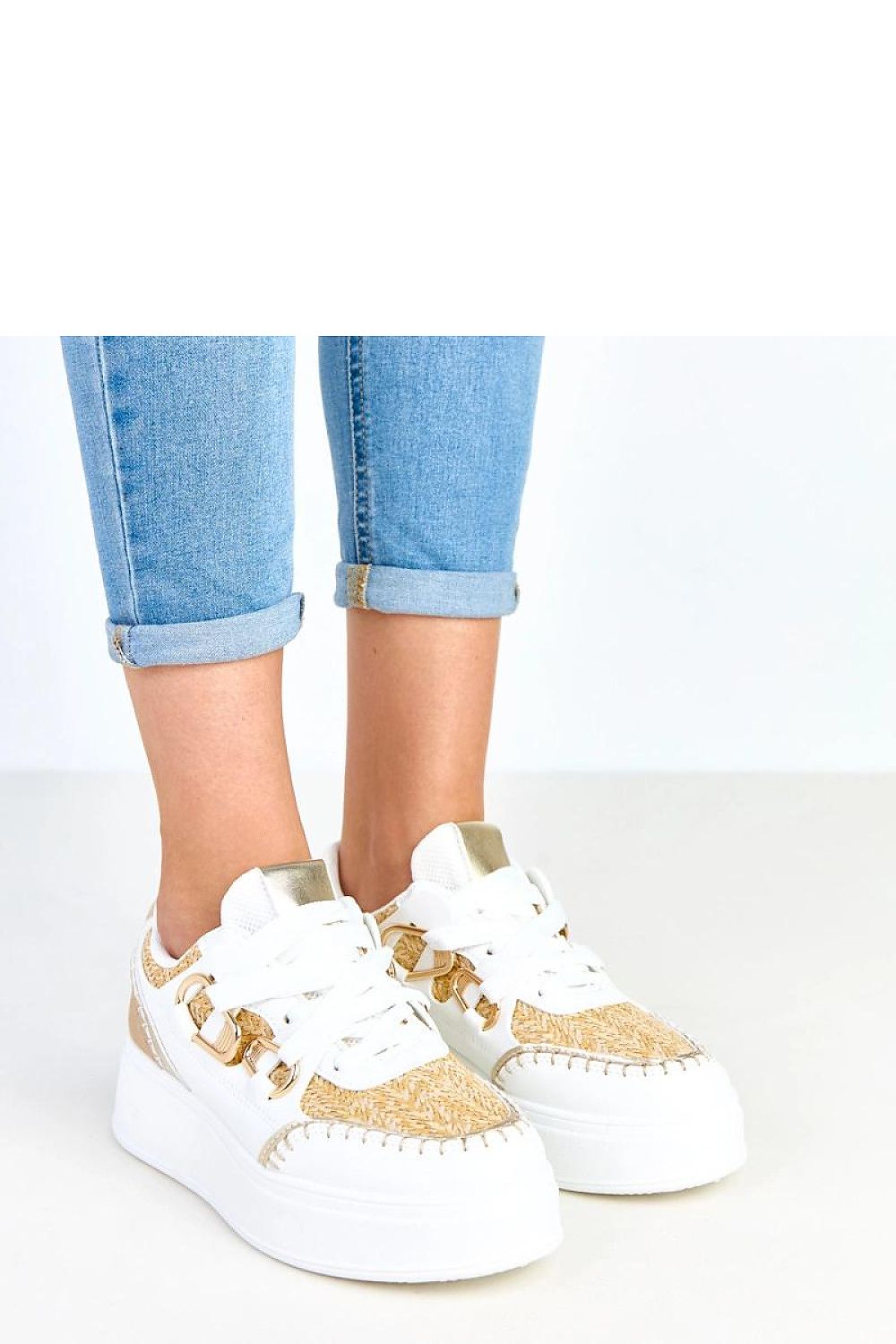 beige sport shoes back view