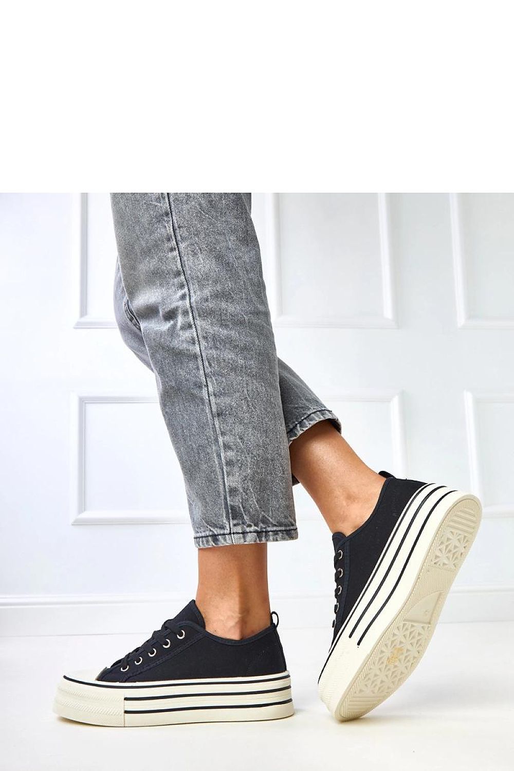 black lace sneakers detail view