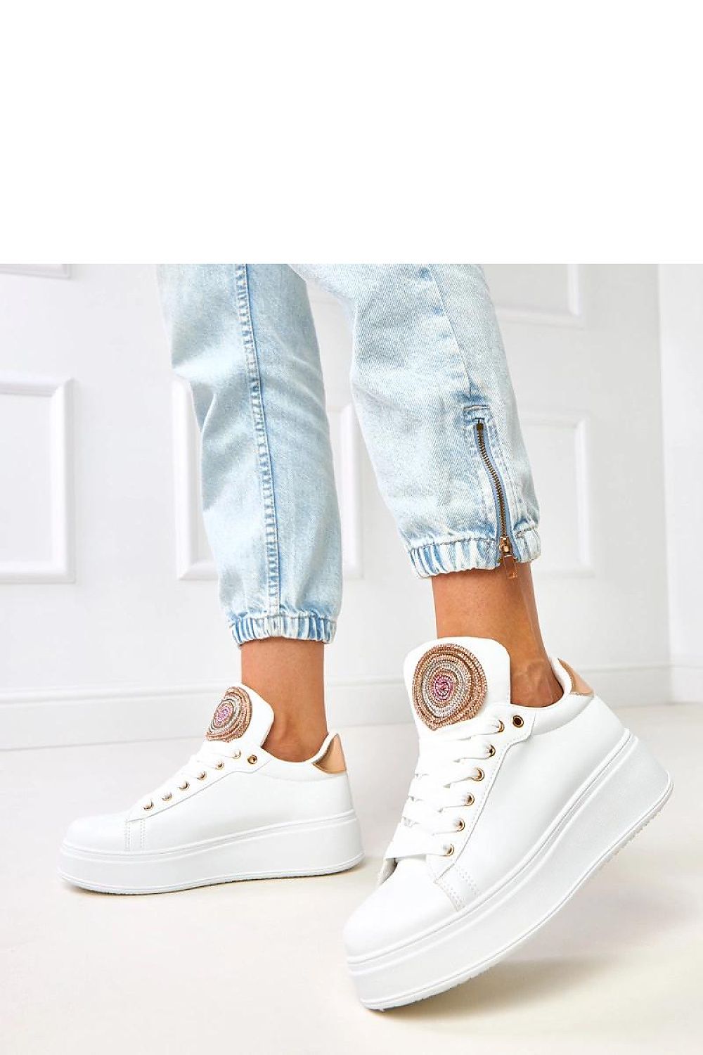 white lace sport shoes detail view