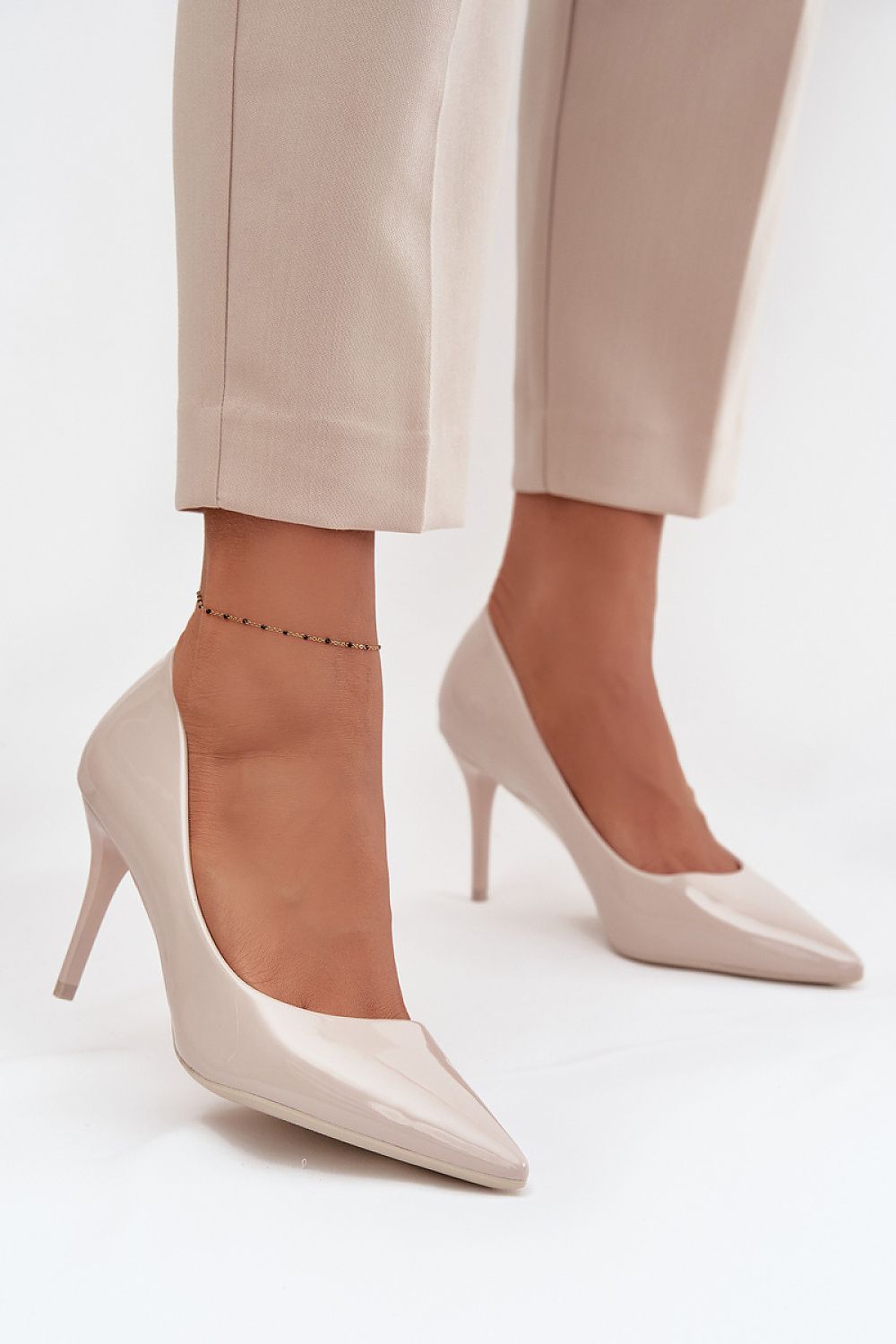 beige mini high heels front view