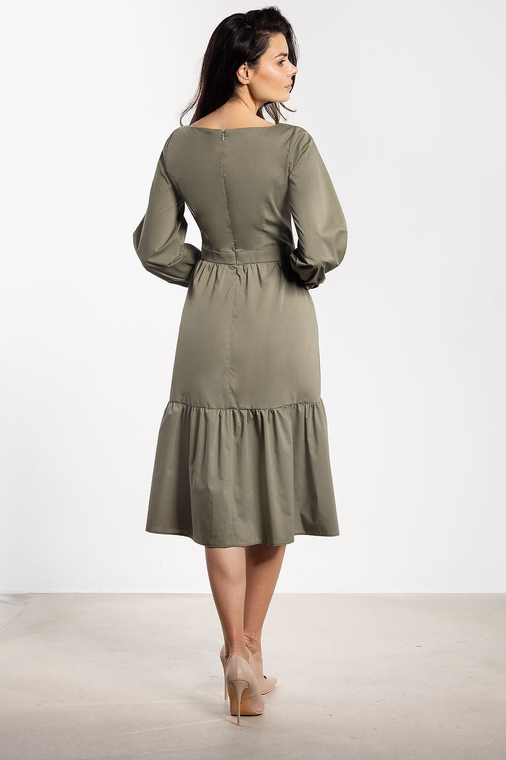 green flared ruffle day dress detail view