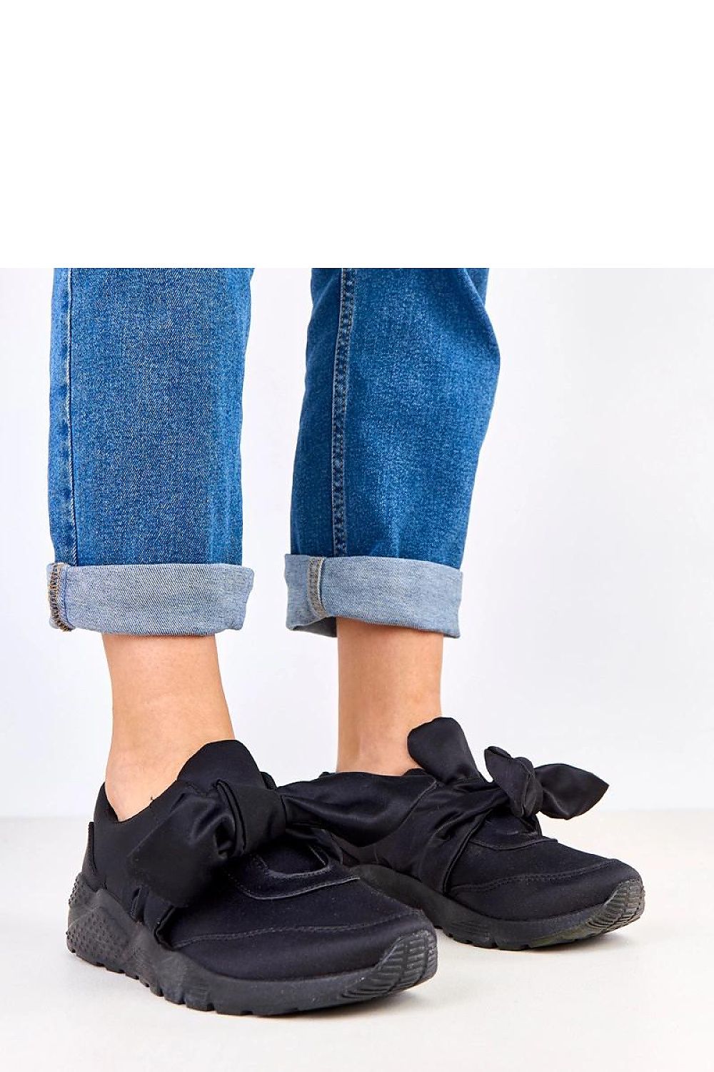 black mini sport shoes front view