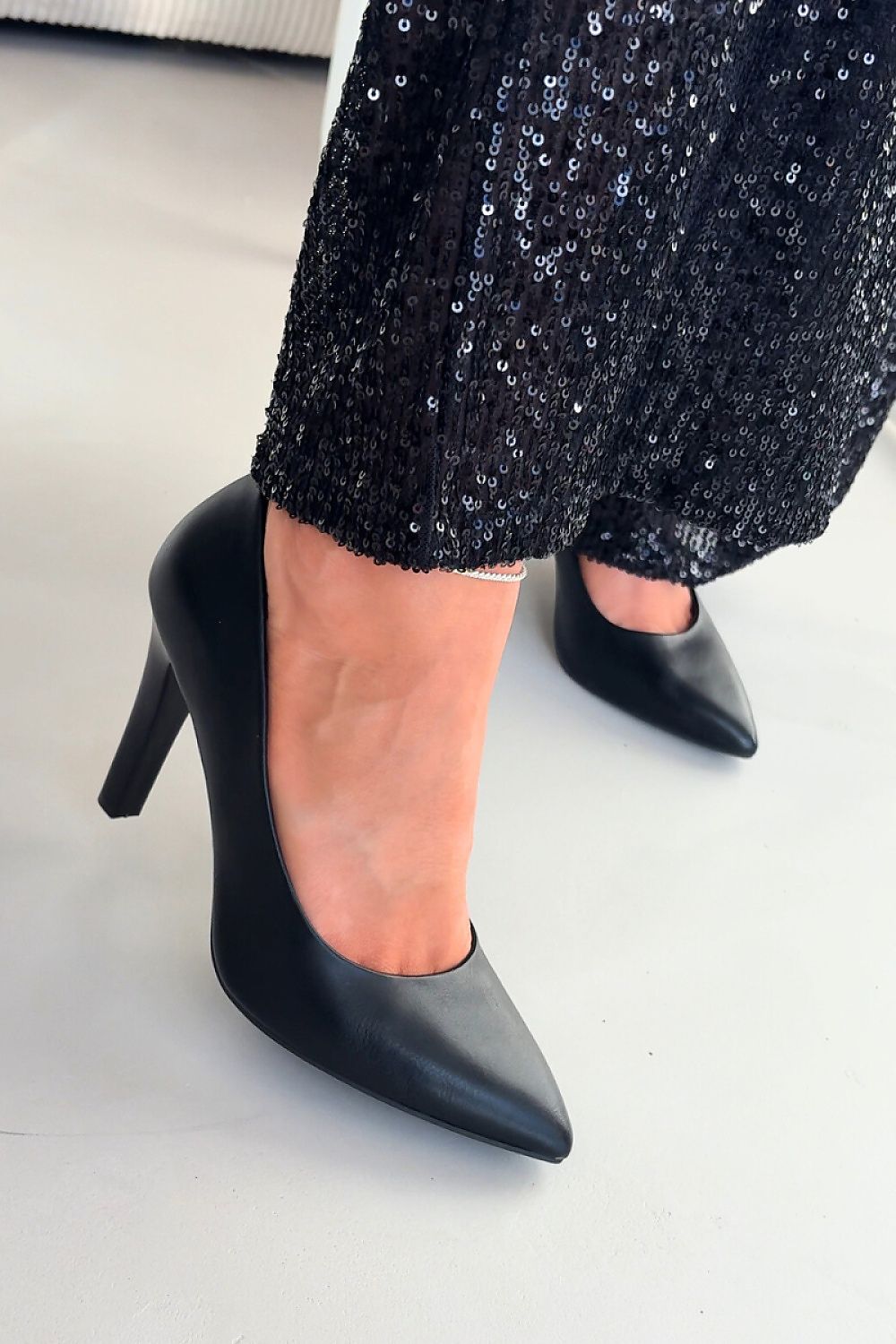 black high heels front view