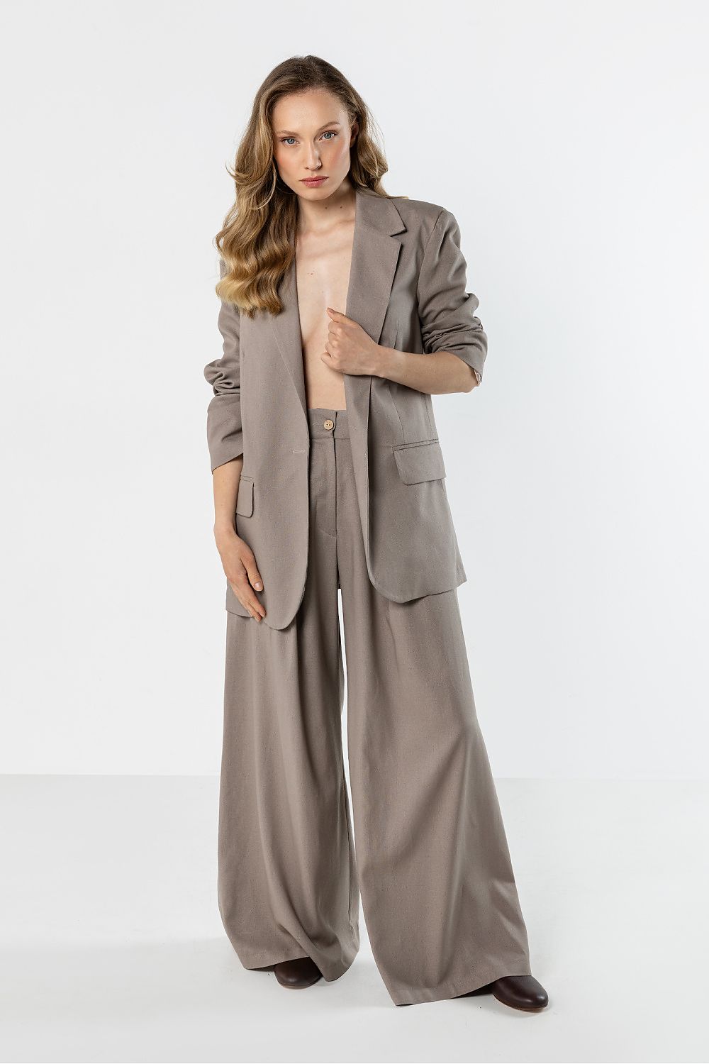 beige long sleeve jacket front view
