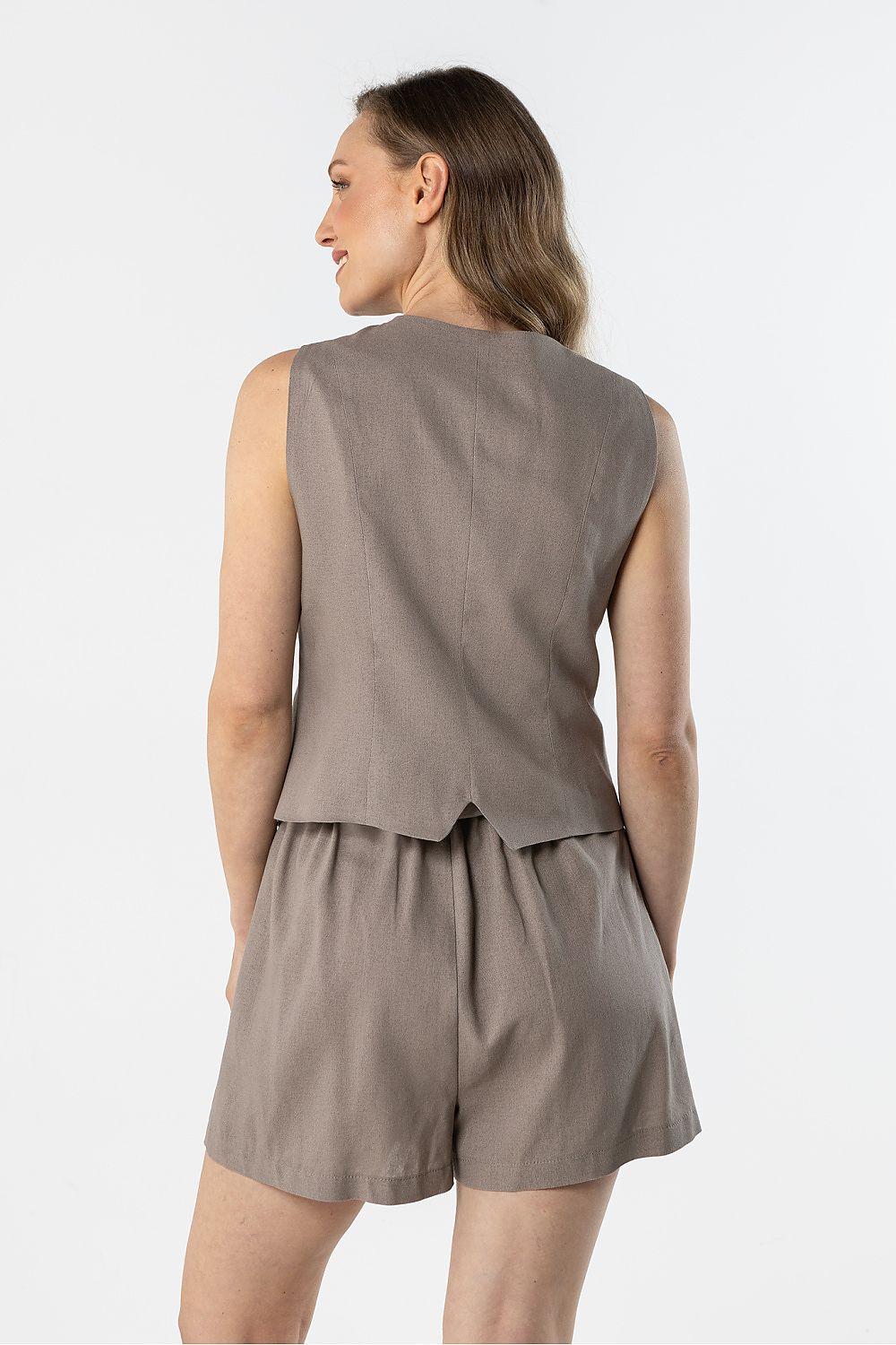 beige mini gilet detail view