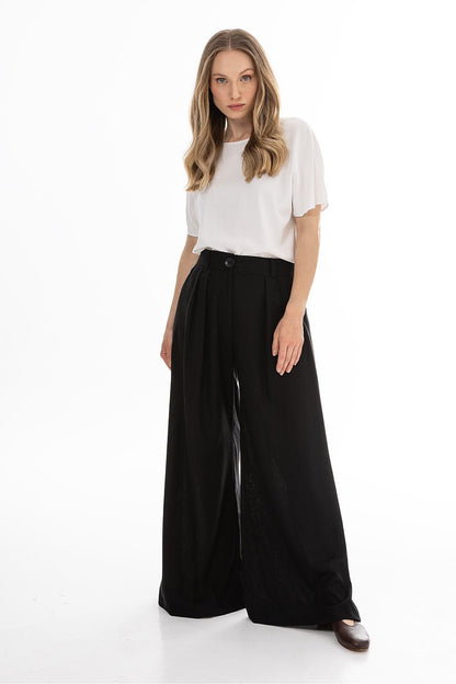 beige women trousers back view
