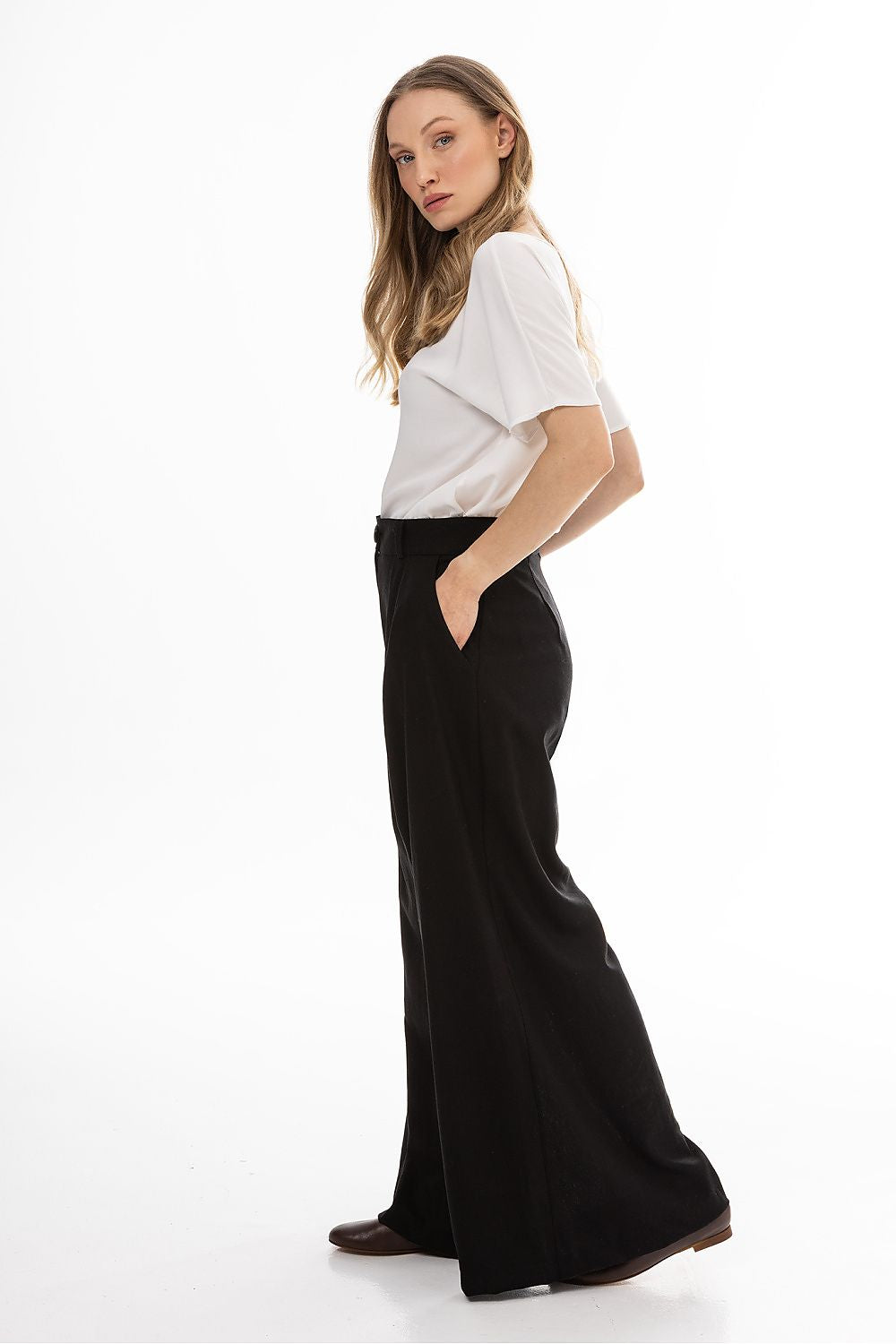 beige women trousers side view