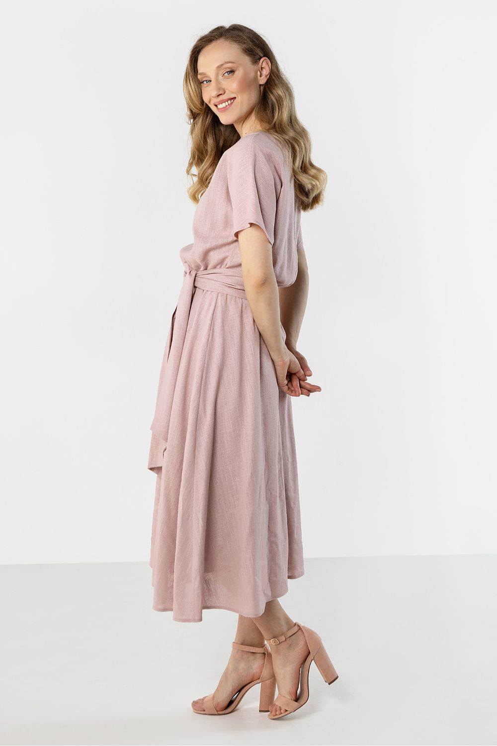 green flared short sleeve day dress side view