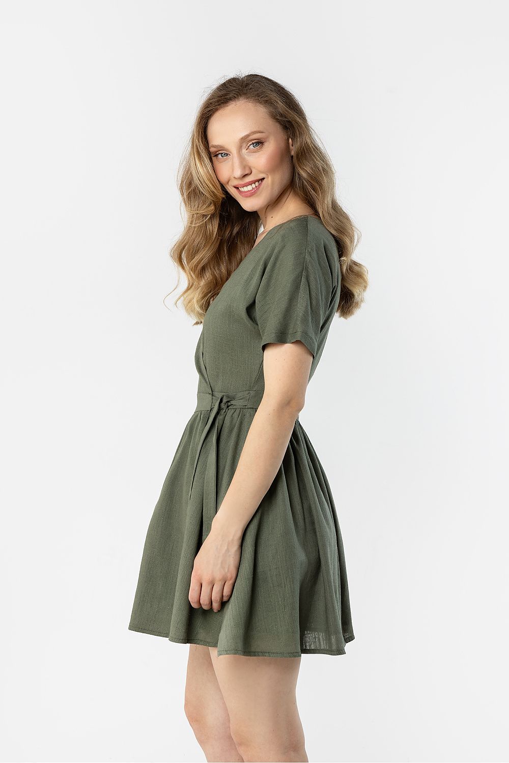 green wrap flared day dress back view