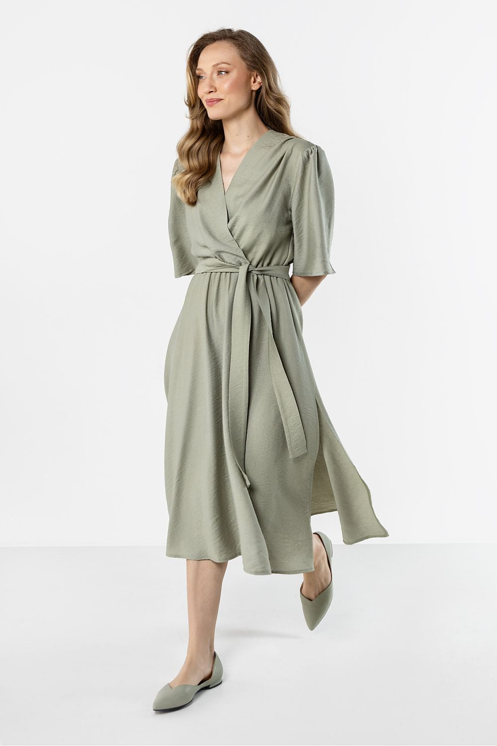 green wrap flared day dress detail view