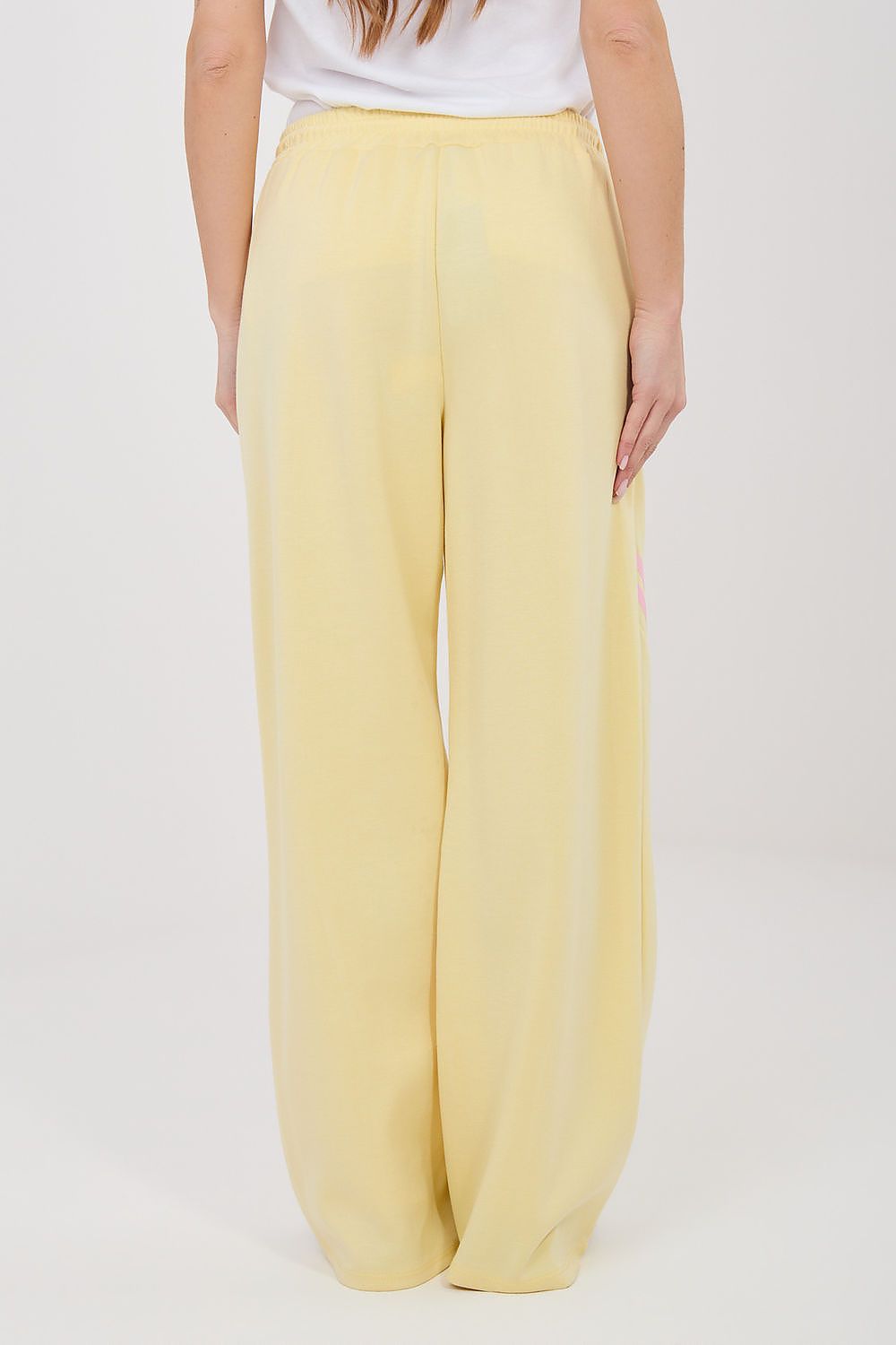 yellow lace tracksuit trousers detail view