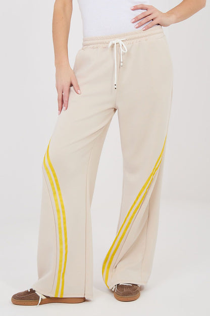 yellow lace tracksuit trousers side view