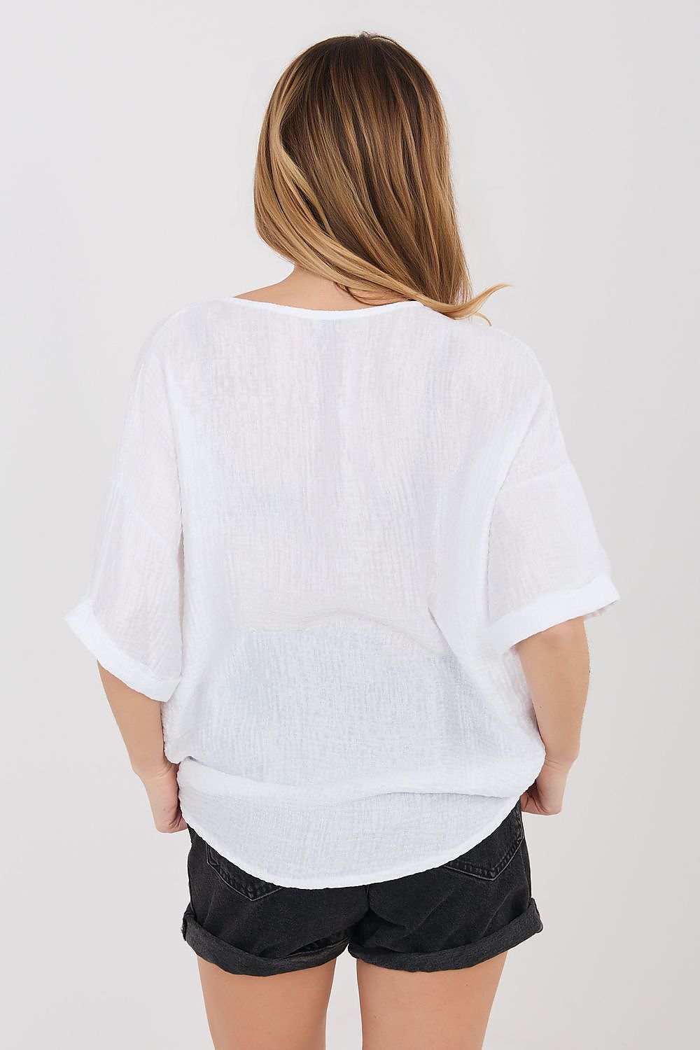 white short sleeve v-neck short sleeve shirt detail view