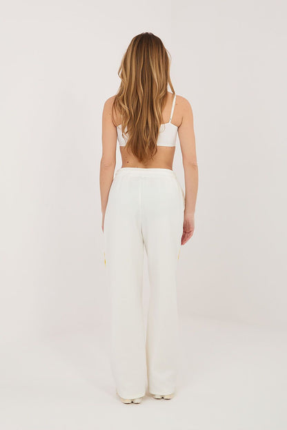 beige lace tracksuit trousers detail view