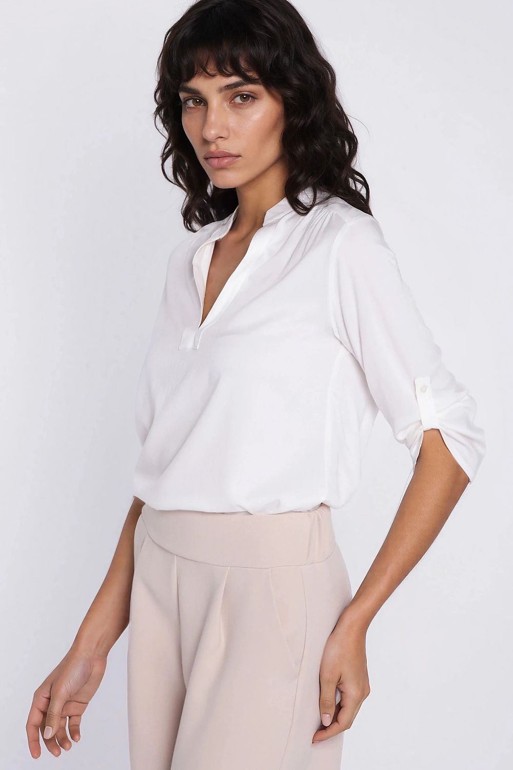 beige blouse back view