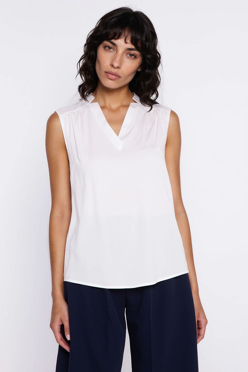 beige sleeveless v-neck blouse front view