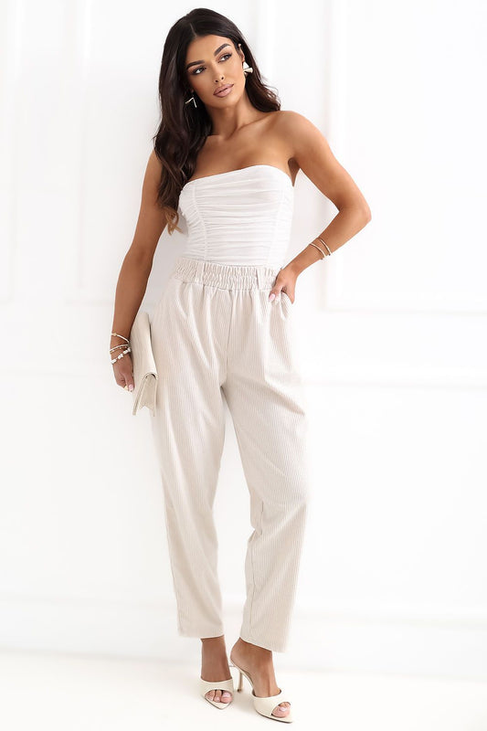 beige corduroy trousers front view