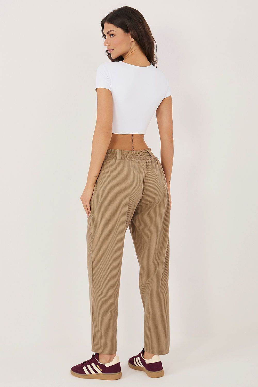 beige corduroy trousers detail view