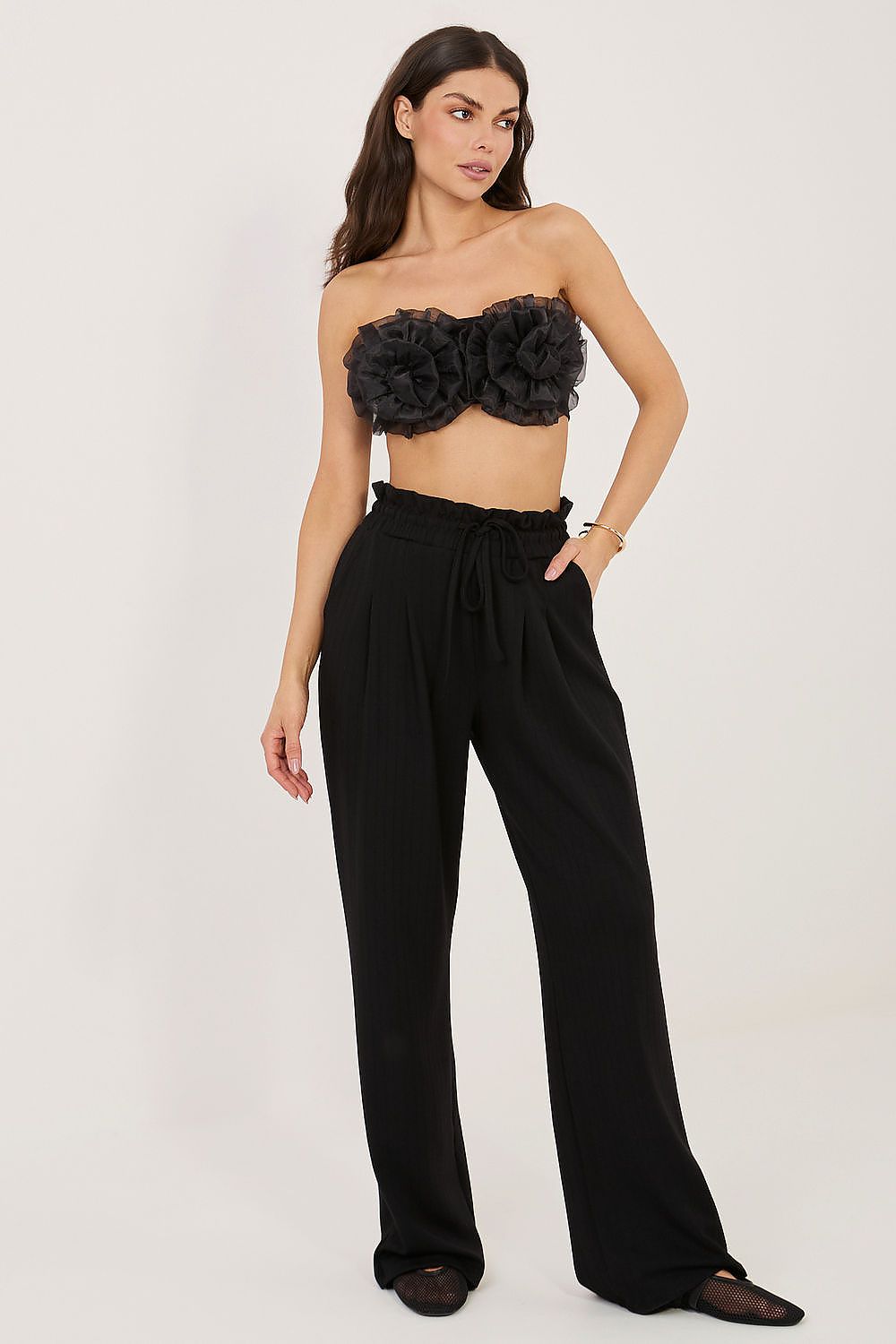 black mini tracksuit trousers front view