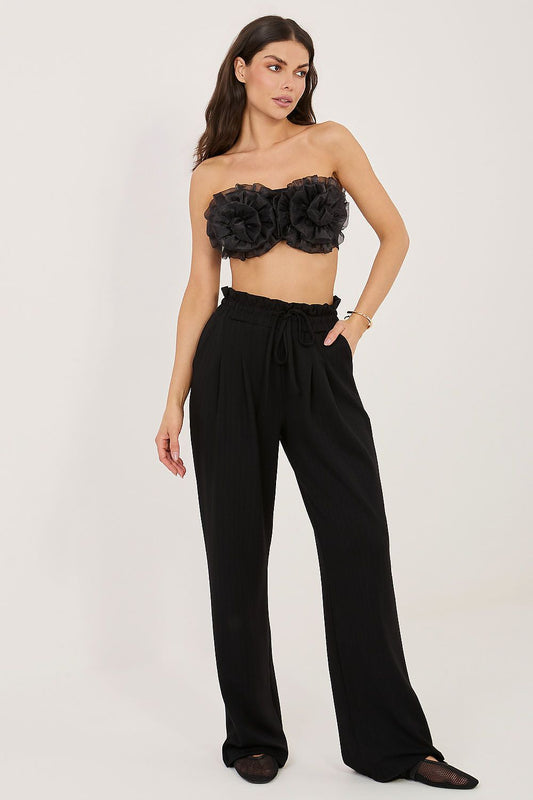 black mini tracksuit trousers front view