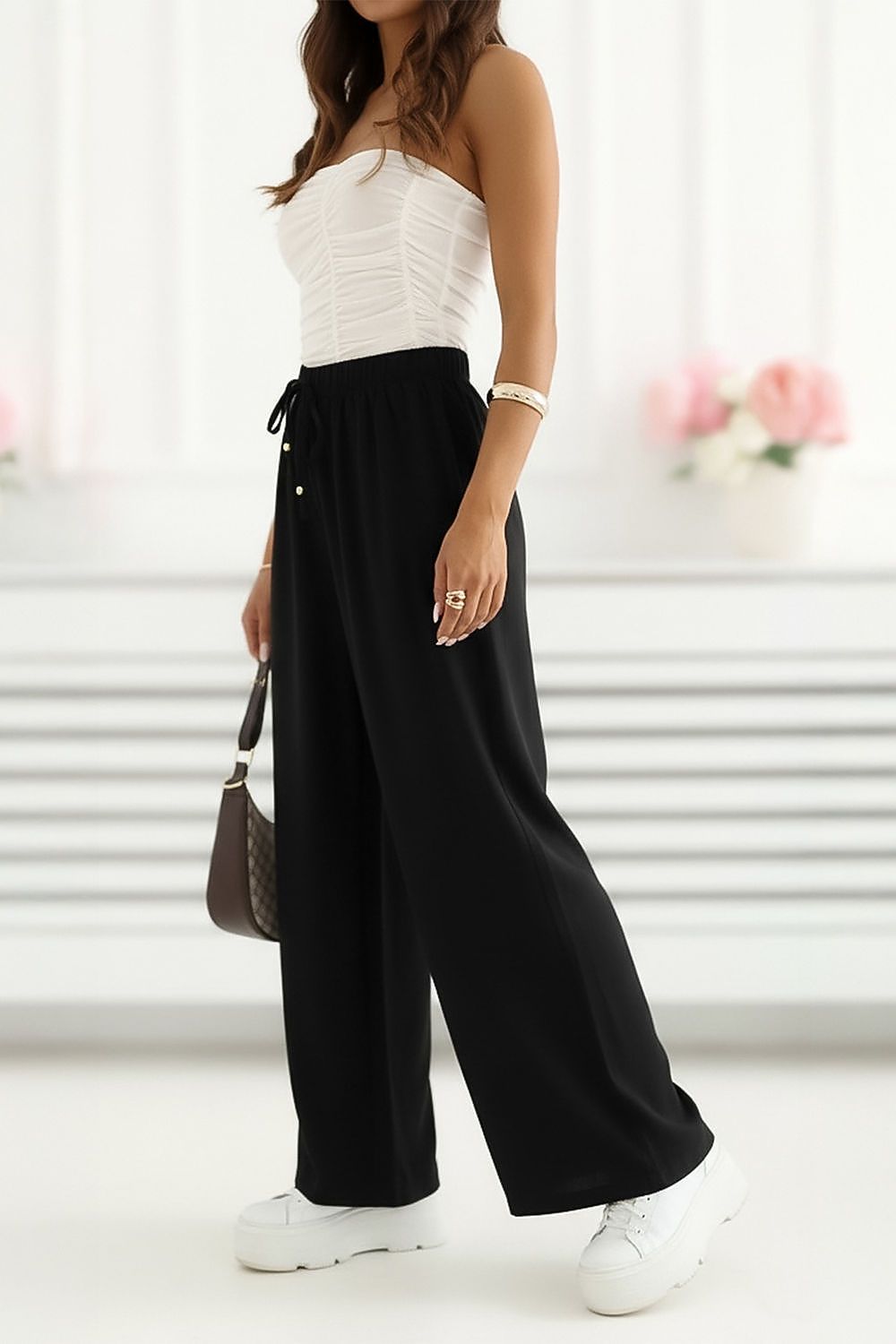 black mini women trousers back view