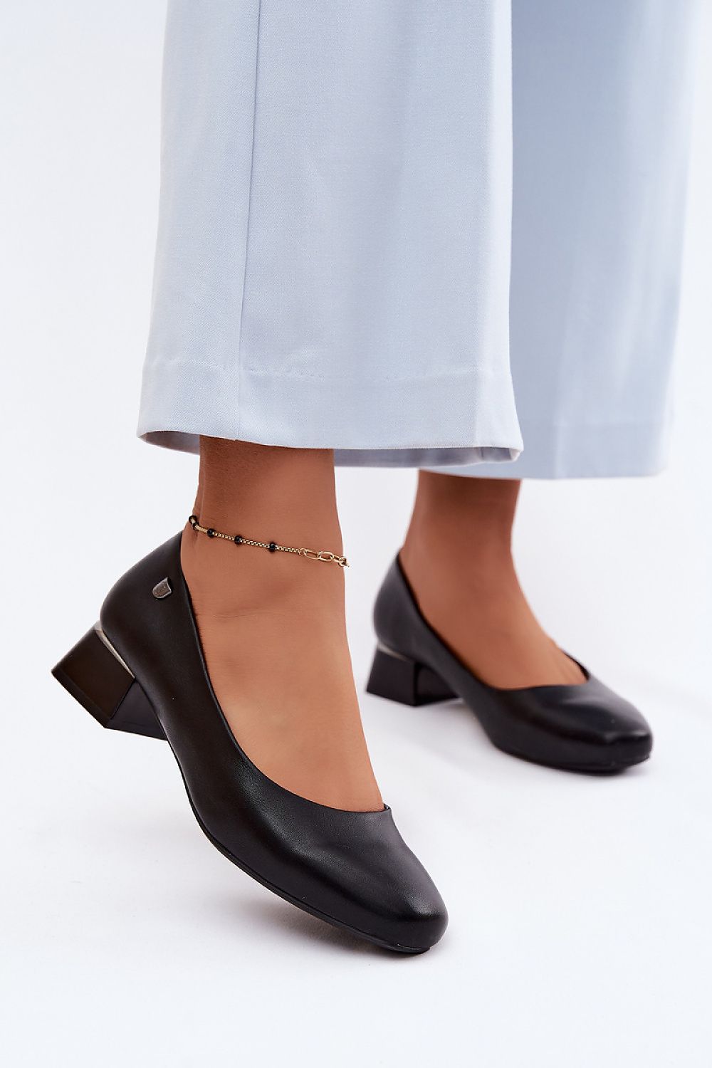 Women's Black and Beige Faux Leather Strap Detail Heel Pumps front view