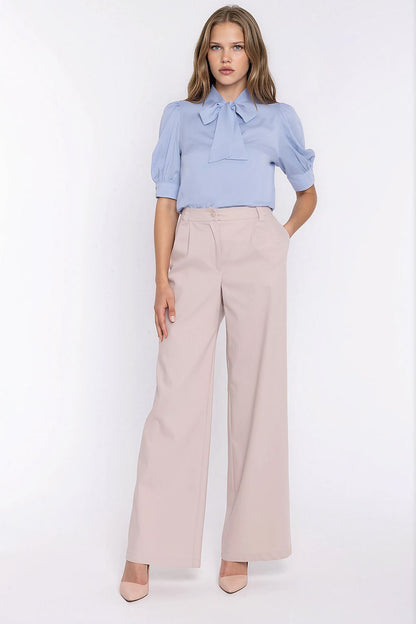 Women's beige wide-leg mid-rise jeans with front pleats by Nife