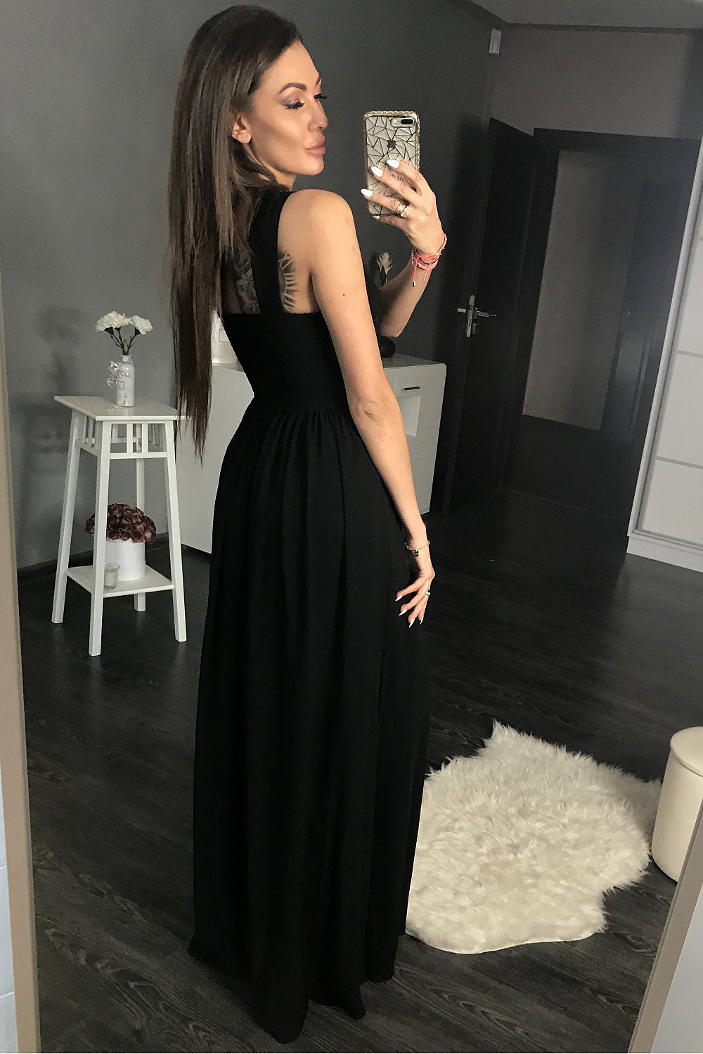 black sleeveless long dress detail view