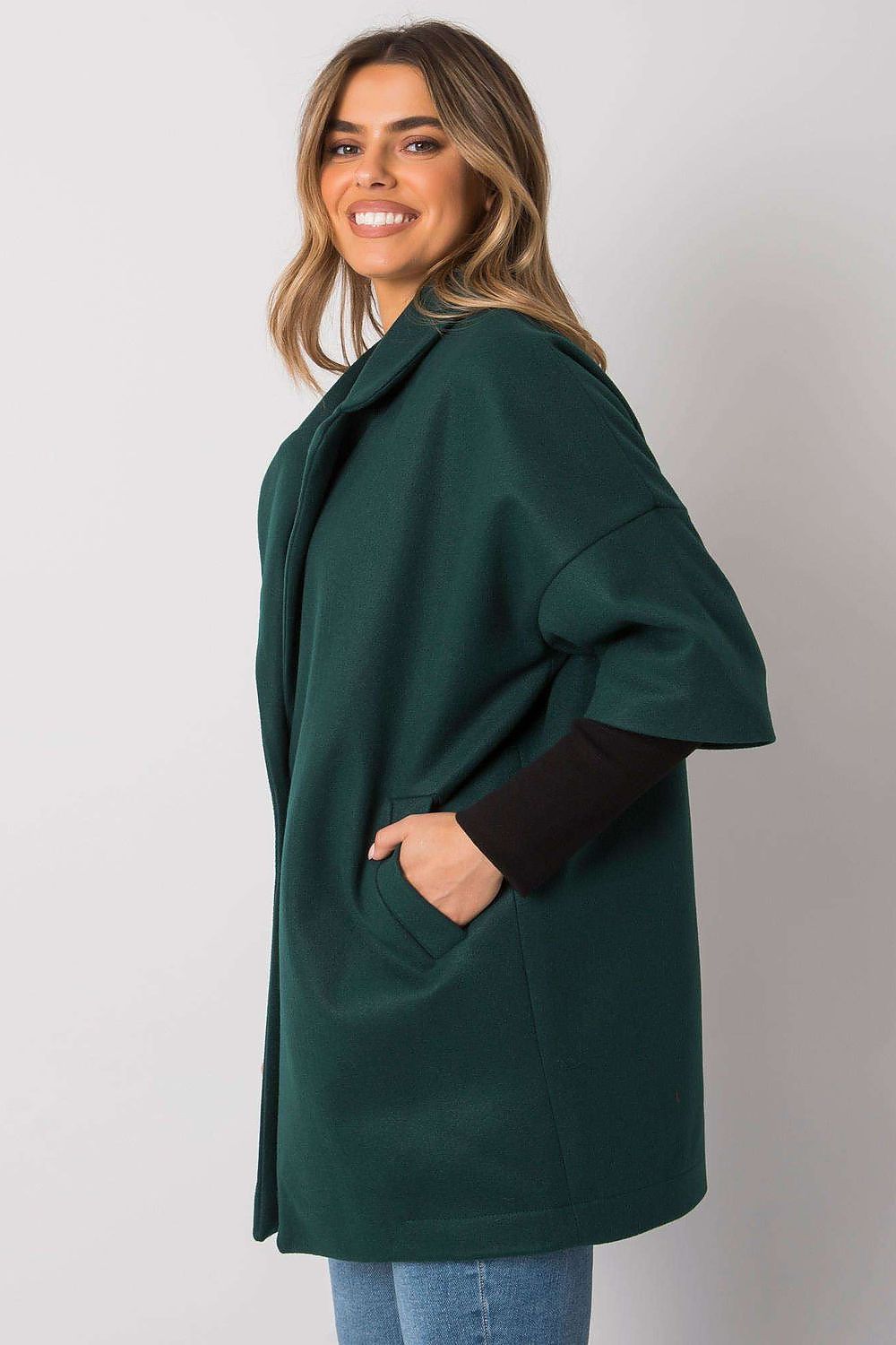 green coat detail view