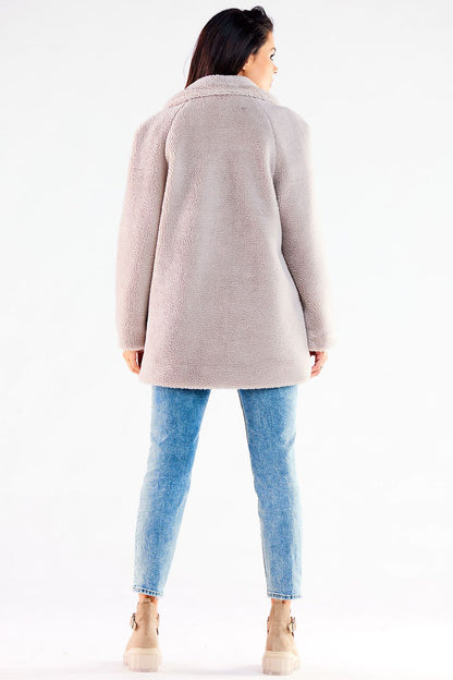 beige coat detail view