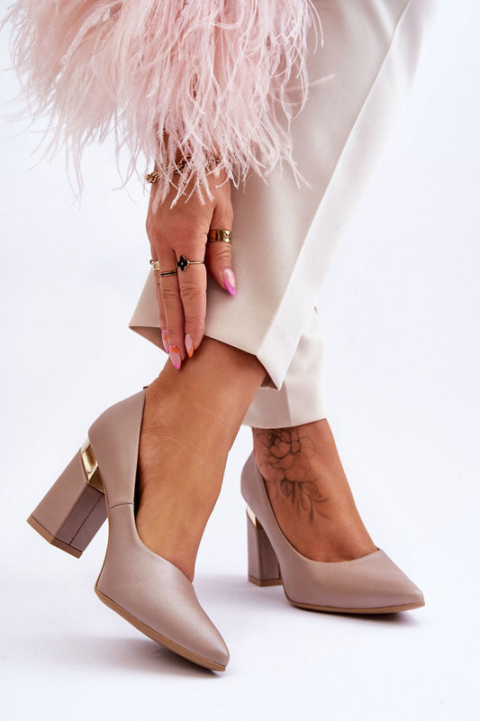 beige block heel pumps front view